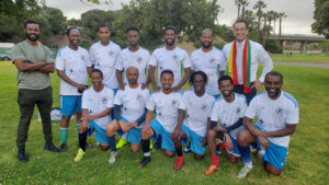 David with players from the Friendship Soccer League