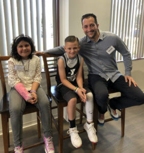 David is pictured with the LLS Boy & Girl of the Year at a pre-fundraising campaign event in February 2020